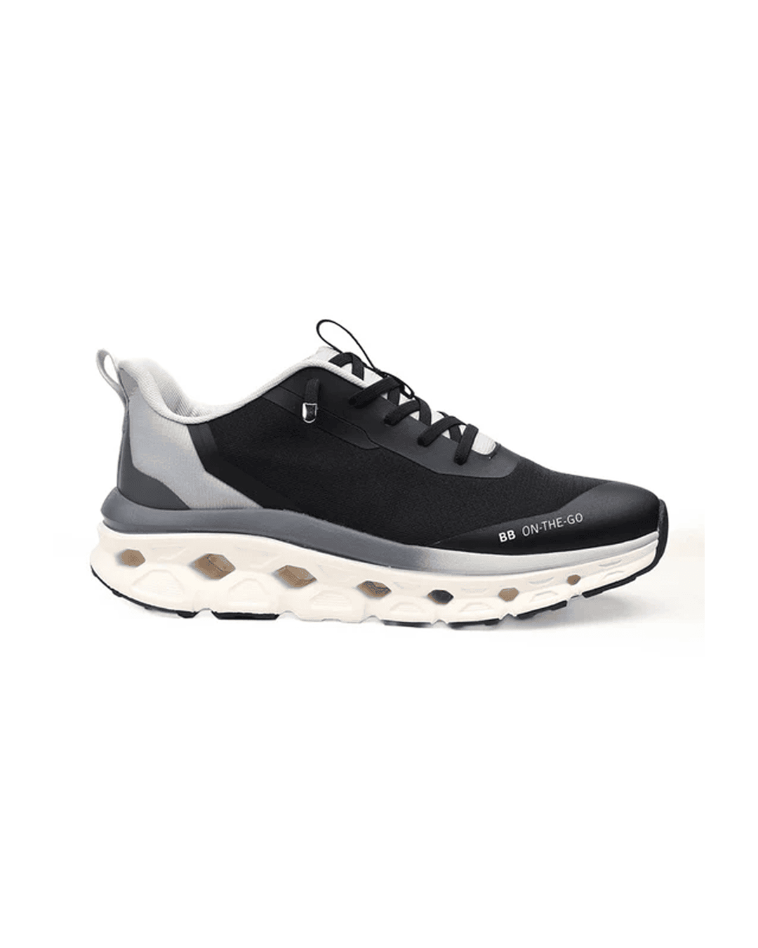Bacca Bucci black and gray sneaker with unique sole design on a white background.